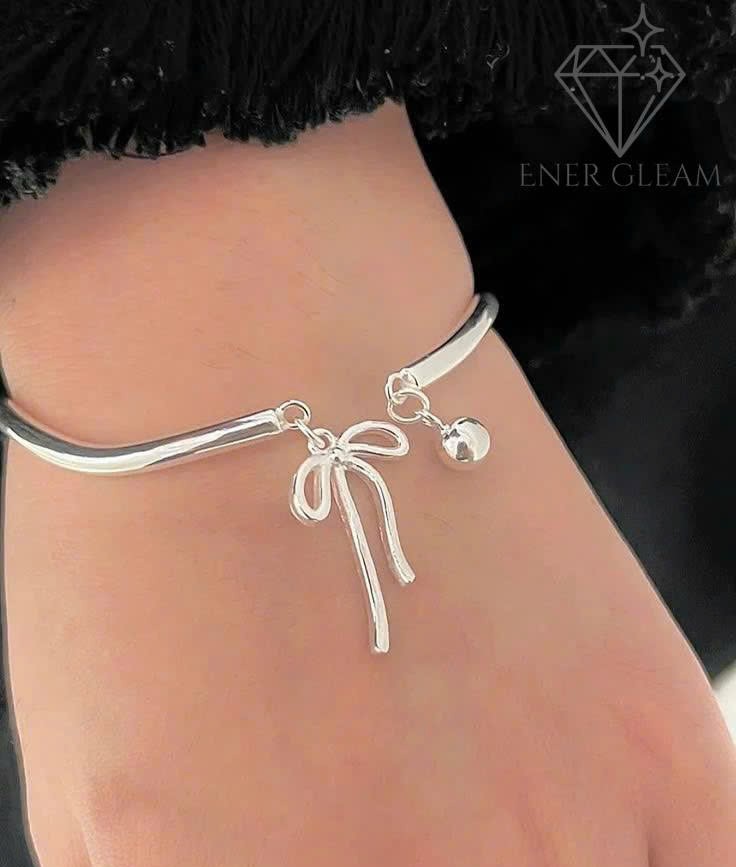 vòng tay bạc nữ charm nơ ener gleam – thiết kế thanh lịch, phụ kiện thời trang cao cấp vòng tay bạc nữ charm nơ ener gleam – thiết kế thanh lịch, phụ kiện thời trang cao cấp